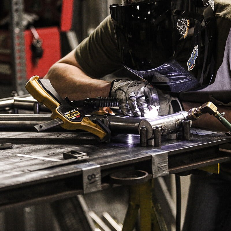 Man welds Litespeed Titanium Bike