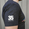Closeup image of shirt sleeve with 35 Legendary Years graphic